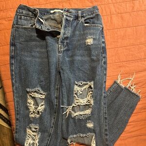 Distressed Blue Jeans